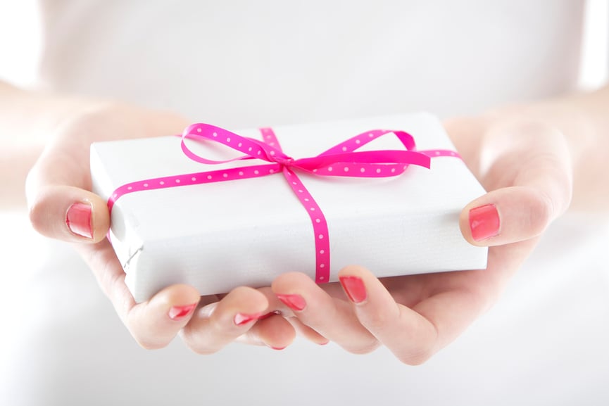 Hands holding beautiful gift